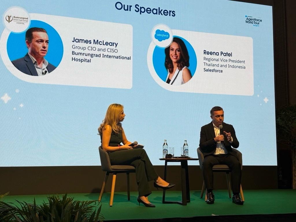 James McLeary taking part in a fireside chat at Salesforce Agentforce World Tour Bangkok, with a speaker slide featuring James McLeary and Reena Patel.